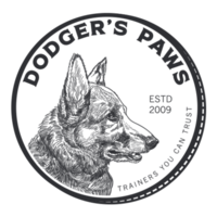 Business logo for Dodger's Paws LLC